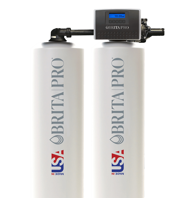 Whole-house well water treatment system with twin tanks