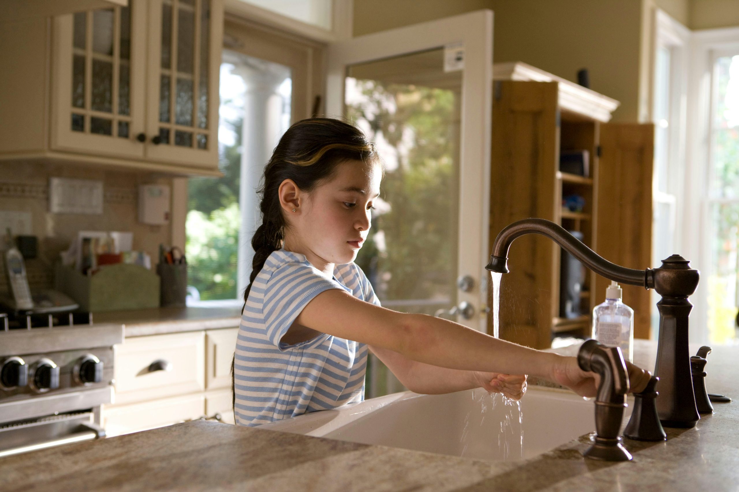 girl in strip using filtered water from the best water filtration in florida